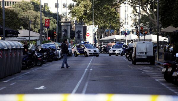 A street is cordoned off after a van crashed into pedestrians near the Las Ramblas avenue in central Barcelona, Spain August 17, 2017. - Sputnik Moldova-România
