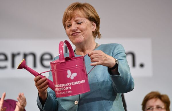 Канцлер Германии Ангела Меркель во время мероприятия Христианского-демократического союза Германии в Хайльбронне - Sputnik Молдова