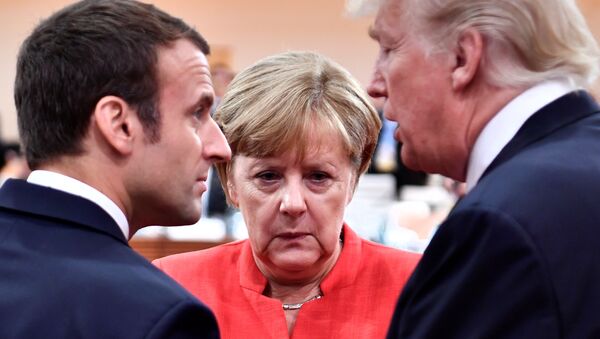 French President Emmanuel Macron, German Chancellor Angela Merkel and US President Donald Trump confer at the start of the first working session of the G20 meeting in Hamburg, Germany, July 7, 2017. - Sputnik Moldova-România