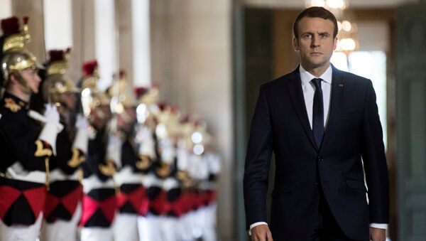 French President Emmanuel Macron walks through the Galerie des Bustes (Busts Gallery) to access the Versailles Palace's hemicycle for a special congress gathering both houses of parliament (National Assembly and Senate), near Paris, France, July 3, 2017. - Sputnik Moldova-România