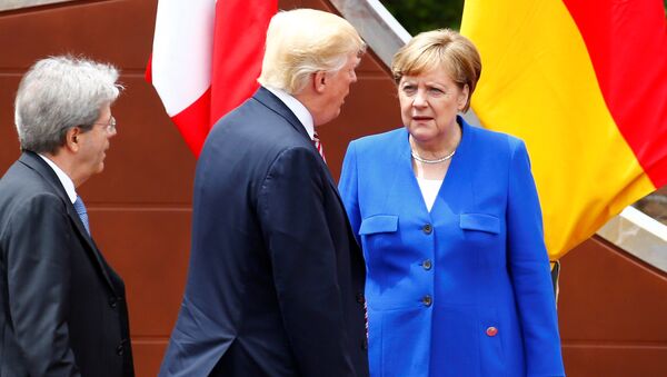 Angela Merkel und Donald Trump beim G7-Gipfel in Italien - Sputnik Moldova-România