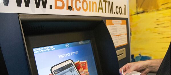 Первый биткоин-банкомат в Тель-Авиве, Израиль, который был открыт в июле 2014 года - Sputnik Молдова