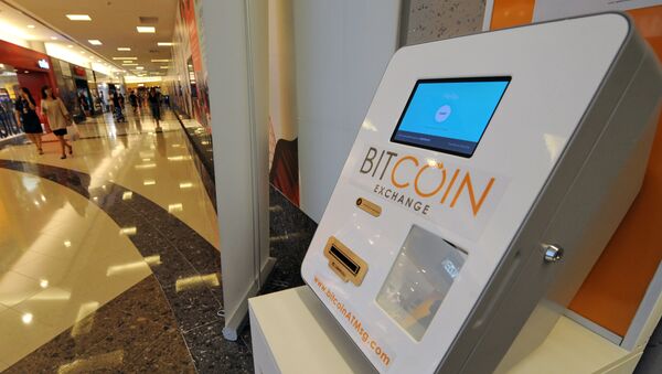 Биткоин-банкомат Bitcoin ATM по купле-продаже цифровой валюты в торговом центре в Сингапуре - Sputnik Moldova-România