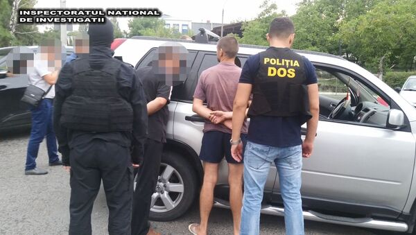 Criminali reţinuţi de poliţişti - Sputnik Moldova