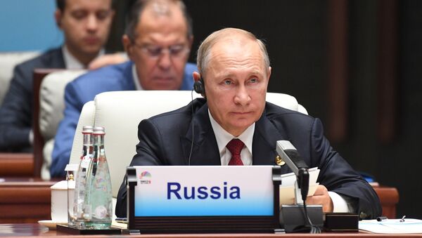 Russian President Vladimir Putin at the BRICS leaders expanded meeting - Sputnik Moldova-România