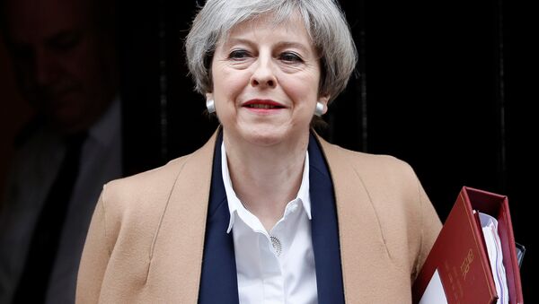 Britain's Prime Minister Theresa May leaves 10 Downing Street in London, March 29, 2017. - Sputnik Moldova