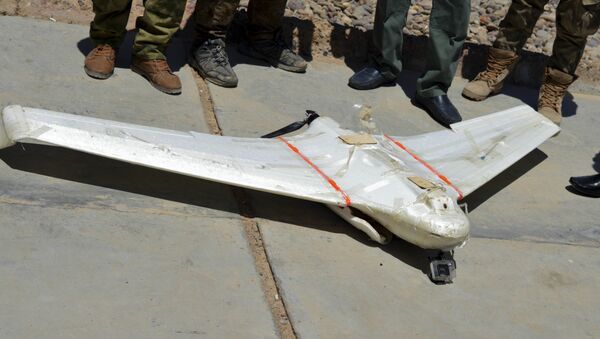 A drone belonging to Islamic State group which was shot down by Iraqi security forces outside Fallujah, 40 miles (65 kilometers) west of Baghdad, Iraq. - Sputnik Moldova-România