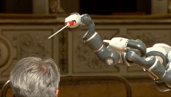 Робот-дирижер дебютировал в итальянской опере - Sputnik Молдова
