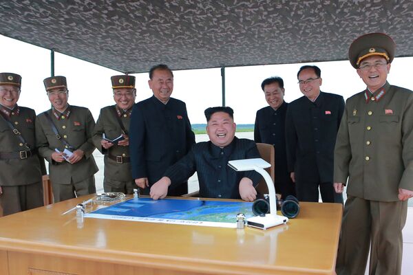 North Korean leader Kim Jong Un inspects a long and medium-range ballistic rocket launch drill in this undated photo released by North Korea's Korean Central News Agency (KCNA) in Pyongyang on August 30, 2017 North Korean leader Kim Jong Un inspects a long and medium-range ballistic rocket launch drill in this undated photo released by North Korea's Korean Central News Agency (KCNA) in Pyongyang on August 30, 2017 - Sputnik Moldova-România