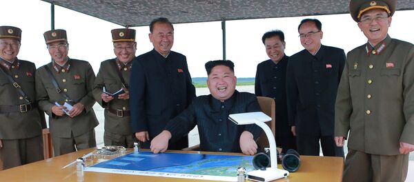 North Korean leader Kim Jong Un inspects a long and medium-range ballistic rocket launch drill in this undated photo released by North Korea's Korean Central News Agency (KCNA) in Pyongyang on August 30, 2017 - Sputnik Moldova-România