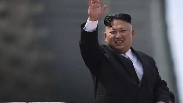 North Korean leader Kim Jong Un waves during a military parade on Saturday, April 15, 2017, in Pyongyang, North Korea to celebrate the 105th birth anniversary of Kim Il Sung, the country's late founder and grandfather of current ruler Kim Jong Un.  - Sputnik Moldova