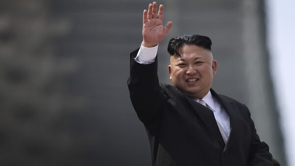 North Korean leader Kim Jong Un waves during a military parade on Saturday, April 15, 2017, in Pyongyang, North Korea to celebrate the 105th birth anniversary of Kim Il Sung, the country's late founder and grandfather of current ruler Kim Jong Un. - Sputnik Moldova-România