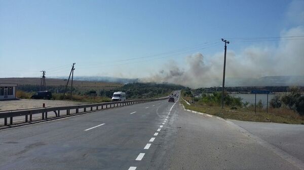 Incendiu de vegetație în apropiere de Ialoveni Incendiu de vegetație în apropiere de Ialoveni - Sputnik Moldova-România