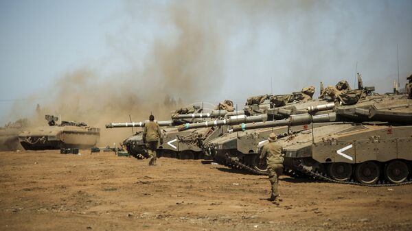 Israeli soldiers manuever Merkava tanks and Namer armored personnel carriers (APCs) during the last day of a military exercise in the northern part of the Israeli-annexed Golan Heights on September 13, 2017.  - Sputnik Moldova-România