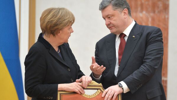 Angela Merkelová a Petro Porošenko - Sputnik Молдова