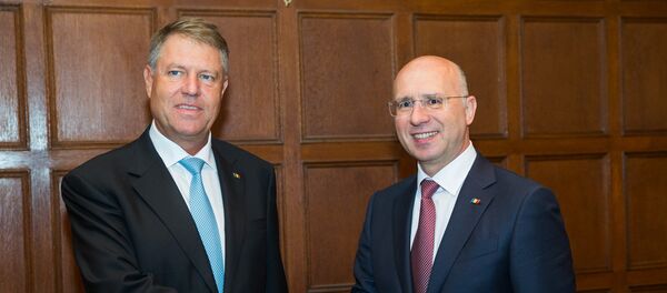 Prim-ministrul Republicii Moldova, Pavel Filip, și președintele României Klaus Iohannis Prim-ministrul Republicii Moldova, Pavel Filip, și președintele României Klaus Iohannis - Sputnik Moldova