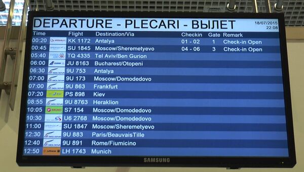 Табло с расписание рейсов в Международном аэропорту Кишинева - Sputnik Молдова