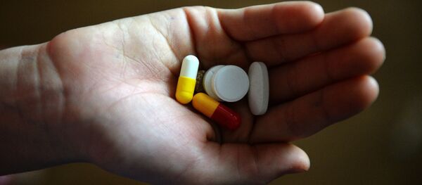 Таблетки в руке - Sputnik Молдова