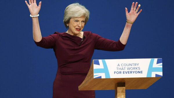 Britain's Prime Minister Theresa May gives her speech on the final day of the annual Conservative Party Conference in Birmingham, Britain, October 5, 2016. - Sputnik Moldova-România