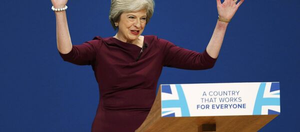 Britain's Prime Minister Theresa May gives her speech on the final day of the annual Conservative Party Conference in Birmingham, Britain, October 5, 2016. Britain's Prime Minister Theresa May gives her speech on the final day of the annual Conservative Party Conference in Birmingham, Britain, October 5, 2016. - Sputnik Moldova-România