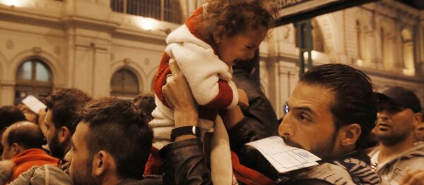 Беженцы из стран Ближнего Востока в Венгрии Беженцы из стран Ближнего Востока в Венгрии - Sputnik Moldova-România