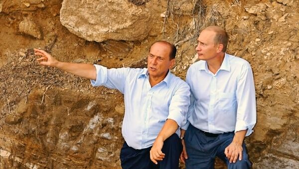 Vladimir Putin and Silvio Berlusconi in Sardinia - Sputnik Moldova-România