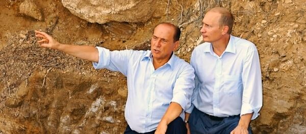 Vladimir Putin and Silvio Berlusconi in Sardinia - Sputnik Moldova-România