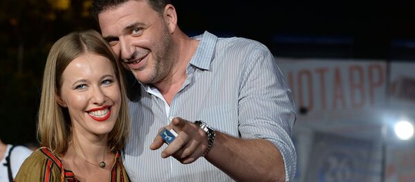 Телеведующая Ксения Собчак с мужем актером Максимом Виторганом Телеведующая Ксения Собчак с мужем актером Максимом Виторганом - Sputnik Молдова