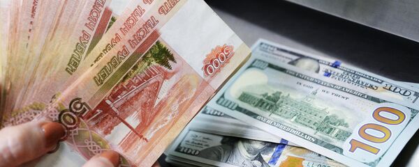 US dollars and rubles inside a currency exchange office of a Sberbank - Sputnik Moldova