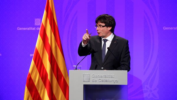 Catalan President Carles Puigdemont speaks during a news conference at Generalitat Palace in Barcelona - Sputnik Молдова