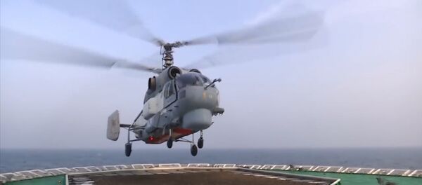 Посадка вертолета Ка-27 на палубу ледокола Илья Муромец - Sputnik Молдова