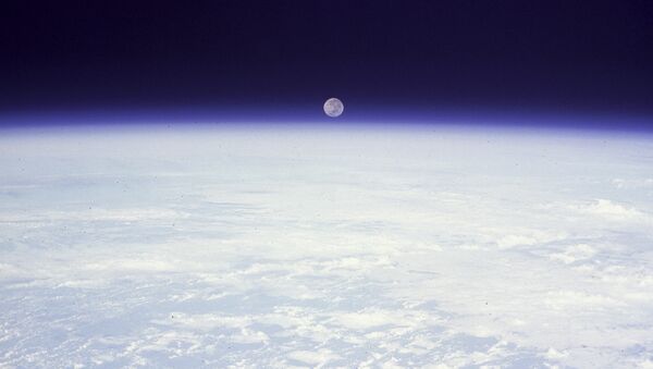 Восход Луны над планетой Земля - Sputnik Moldova-România