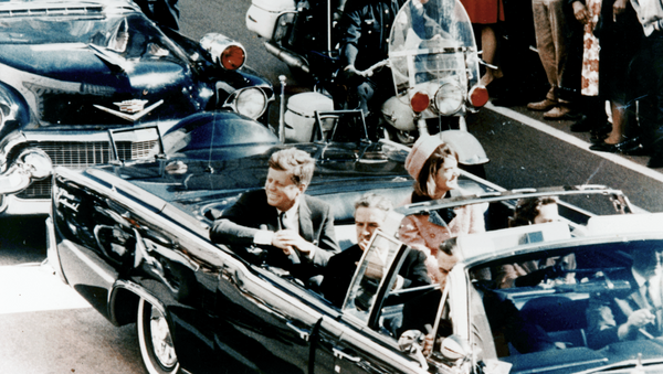 President Kennedy in the limousine in Dallas, Texas, on Main Street, minutes before the assassination. Also in the presidential limousine are Jackie Kennedy, Texas Governor John Connally, and his wife, Nellie - Sputnik Moldova-România