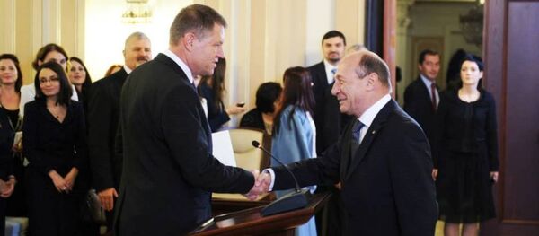 Klaus Iohannis și Traian Băsescu Klaus Iohannis și Traian Băsescu - Sputnik Moldova-România