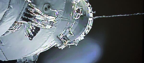 Nava spațială Shenzhou-10 în timp ce efectuează andocarea satelitului Tiangong-1 pe orbita - Sputnik Moldova-România