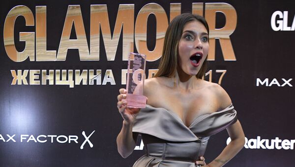 Телеведущая Регина Тодоренко, получившая награду в номинации Телезвезда года, на торжественной церемонии вручения премии Женщина года по версии журнала Glamour - Sputnik Молдова