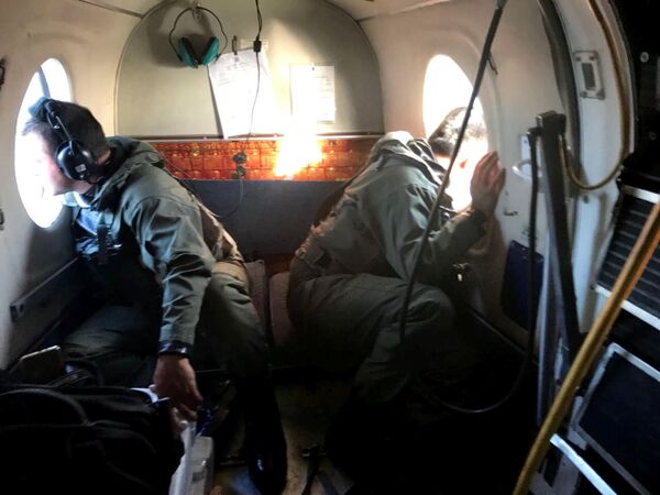 Члены аргентинского военно-морского флота во время поисков пропавшей подводной лодки Сан-Хуан - Sputnik Молдова