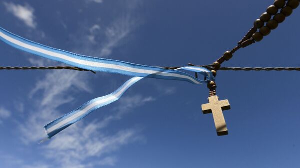 Крест на ленте цветов аргентинского флага - Sputnik Moldova