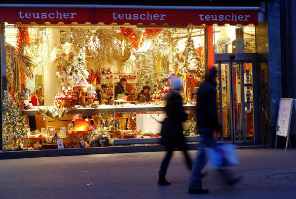 Магазин шоколадных конфет Teuscher Chocolates store на торговой улице Банхофштрассе в Цюрихе, Швейцария - Sputnik Молдова