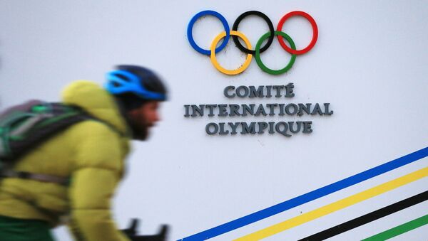 Вывеска штаб-квартиры Международного олимпийского комитета (МОК) в Лозанне - Sputnik Молдова