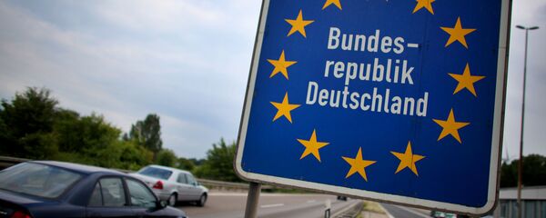 Ein Schild mit der Überschrift Bundesrepublik Deutschland an der Autobahn bei Aachen - Sputnik Молдова
