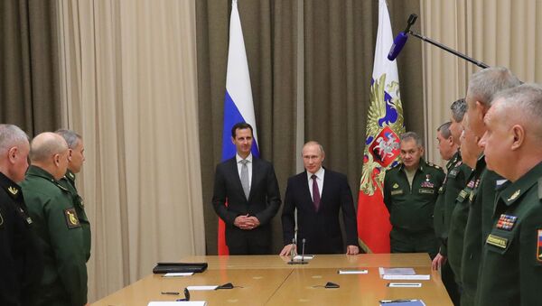 Russian President Vladimir Putin meets with Syrian President Bashar Al-Assad, November 2017 - Sputnik Moldova-România