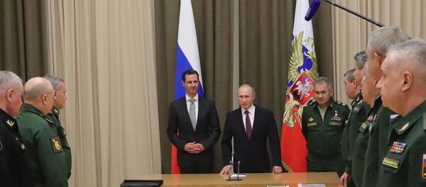 Russian President Vladimir Putin meets with Syrian President Bashar Al-Assad, November 2017 - Sputnik Moldova-România