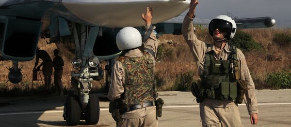 Российская боевая авиация на аэродроме Хмеймим в Сирии Российская боевая авиация на аэродроме Хмеймим в Сирии - Sputnik Moldova-România