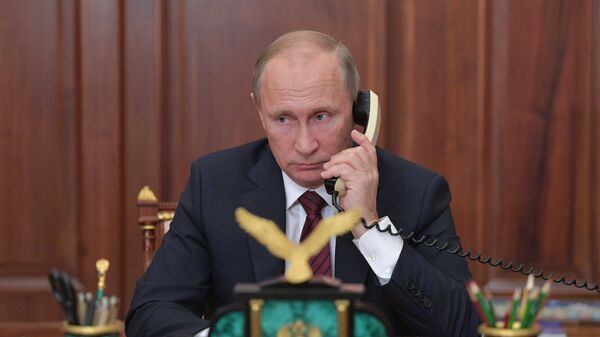 Президент РФ В. Путин провел телефонный разговор с главами ДНР А. Захарченко и ЛНР И. Плотницким - Sputnik Moldova-România
