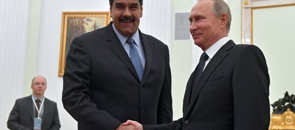 October 4, 2017. Russian President Vladimir Putin and President of the Bolivarian Republic of Venezuela Nicolas Maduro, left, during a meeting. - Sputnik Moldova-România
