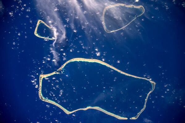 Каролинские острова, снятые с борта МКС космонавтом Роскосмоса Сергеем Рязанским - Sputnik Молдова