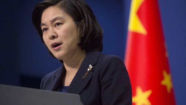 In this Wednesday, January 6, 2016, file photo, Chinese Foreign Ministry spokeswoman Hua Chunying speaks during a briefing at the Chinese Foreign Ministry in Beijing, China. - Sputnik Moldova-România