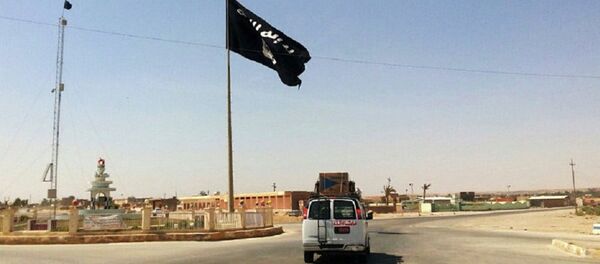 Флаг террористической группировки Исламское государство. Архивное фото - Sputnik Moldova