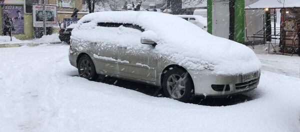 Снегопад в Кишиневе Снегопад в Кишиневе - Sputnik Молдова